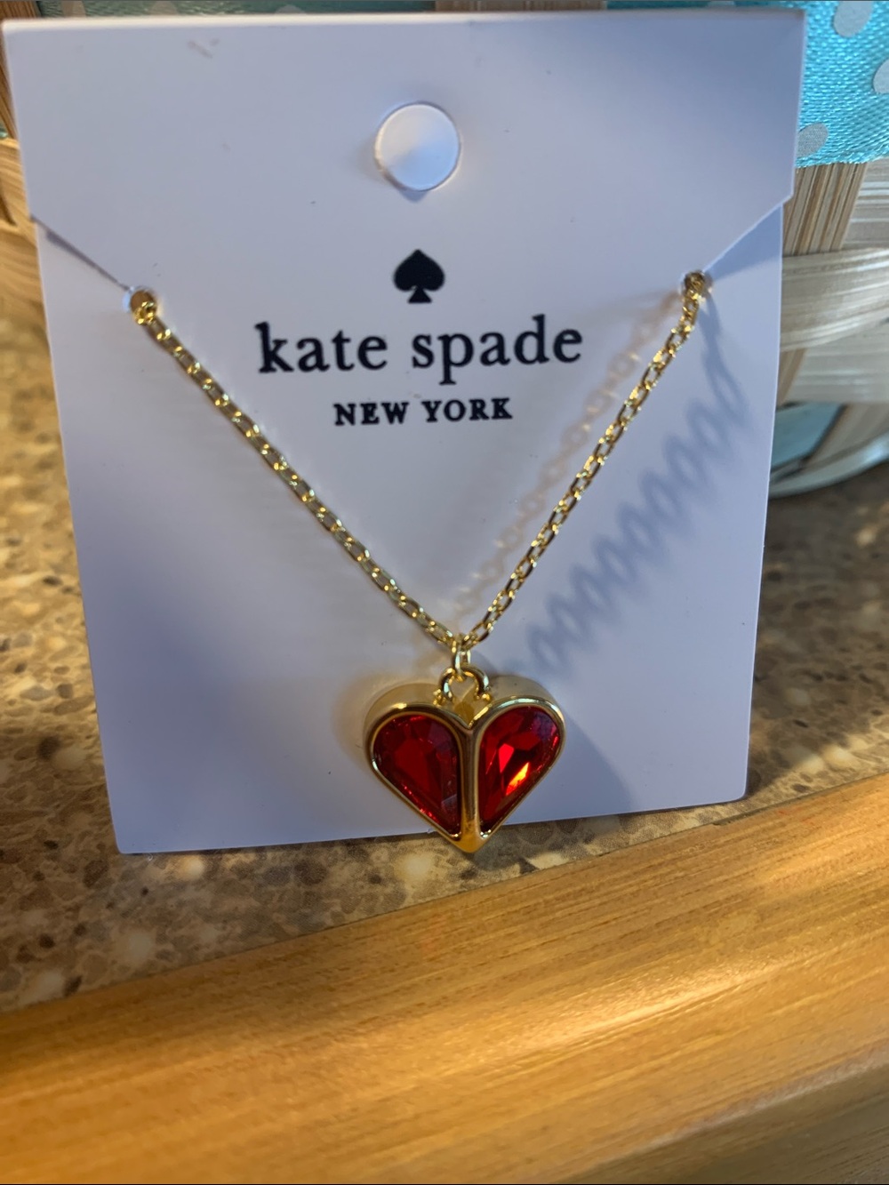 kate spade gold-tone necklace with red heart gem pendant